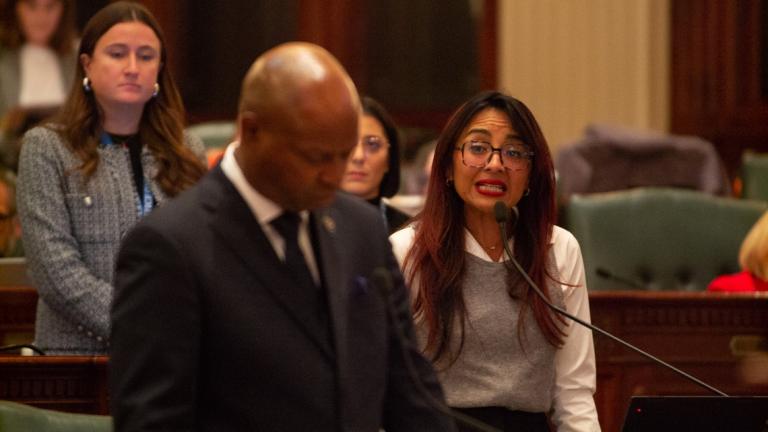 State Rep. Dagmara Avelar, D-Romeoville, speaks on the House floor in October 2025, with House Speaker Emanuel “Chris” Welch in the foreground. Welch named Avelar to lead a private working group on sexual harassment policy in the House. (Jerry Nowicki / Capitol News Illinois)