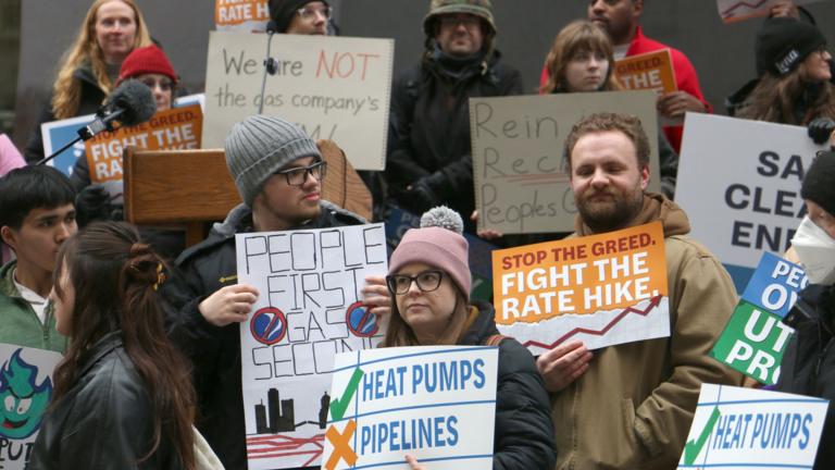 Customers and utility watchdogs took to Daley Plaza with signs and chanting to denounce Peoples Gas’ January rate hike request. The April 1, 2026, demonstration drew more than 100 participants. (Maggie Dougherty / Capitol News Illinois)