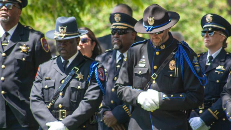 Members of the honor guard stand during an annual ceremony honoring fallen Illinois law enforcement officers. The ceremony on May 7, 2026, honored a Chicago police officer and Park Forest detective who died while on duty in 2025. (Jenna Schweikert / Capitol News Illinois)