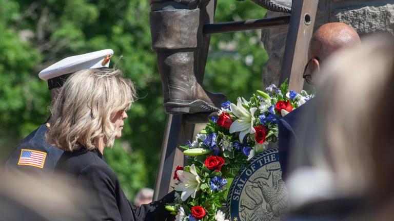  A wreath honors Capt. David Meyer of the Chicago Fire Department. Meyer was honored during an annual awards ceremony on May 12, 2026, after his death last year from injuries sustained battling a garage fire. (Jenna Schweikert / Capitol News Illinois)