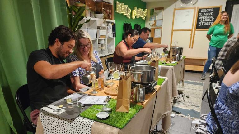 People make candles during a class at Above Average Candle Studio. (Erica Gunderson / WTTW News)