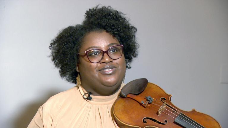 “I love the tone of the instrument, I love how when it's placed on my shoulder it’s close to my heart. So I feel like I can truly just sing through my instrument and express you know whatever I'm going through, however I feel,” said violinist Caitlin Edwards. (WTTW News)