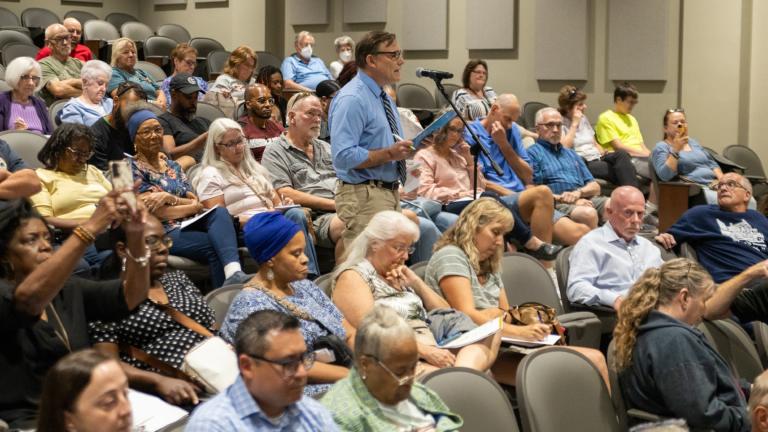 Citizens Utility Board Director of Communications Jim Chilsen delivers a public comment on behalf of his organization at an Illinois Commerce Commission hearing in August 2024. (Andrew Adams / Capitol News Illinois)