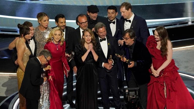 The cast and crew of “CODA” accept the award for best picture at the Oscars on Sunday, March 27, 2022, at the Dolby Theatre in Los Angeles. (AP Photo / Chris Pizzello)