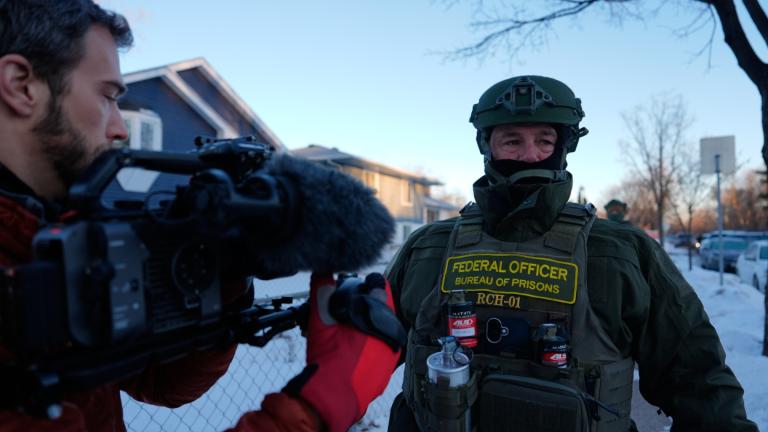 Federal Bureau of Prisons officers threaten AP video journalist Mark Vancleave with arrest on Wednesday, Jan. 28, 2026, in Minneapolis. (AP Photo / Julia Demaree Nikhinson)