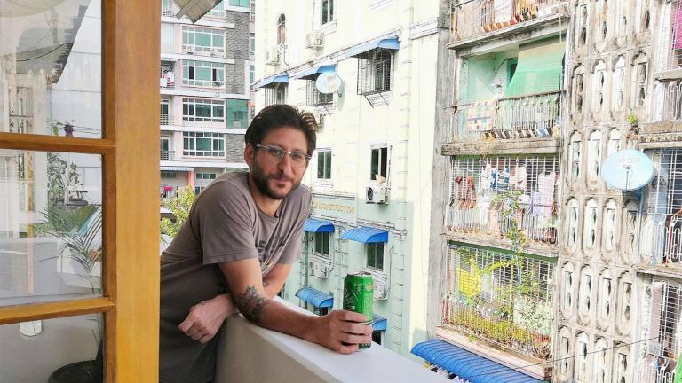 This photo provided by the family courtesy shows Danny Fenster posing for a photo in Yangon, Myanmar, in 2020. (family courtesy photo via AP)