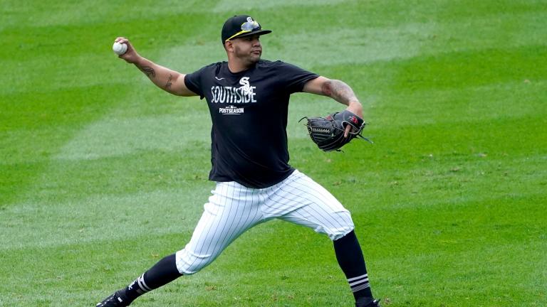 Chicago White Sox’s Carlos Rodon throws a short pitching session after Game 4 of an ALDS baseball game was postponed due to a forecast of inclement weather Monday, Oct. 11, 2021, in Chicago. The makeup game is scheduled for Tuesday afternoon at Guaranteed Rate Field. (AP Photo / Charles Rex Arbogast)