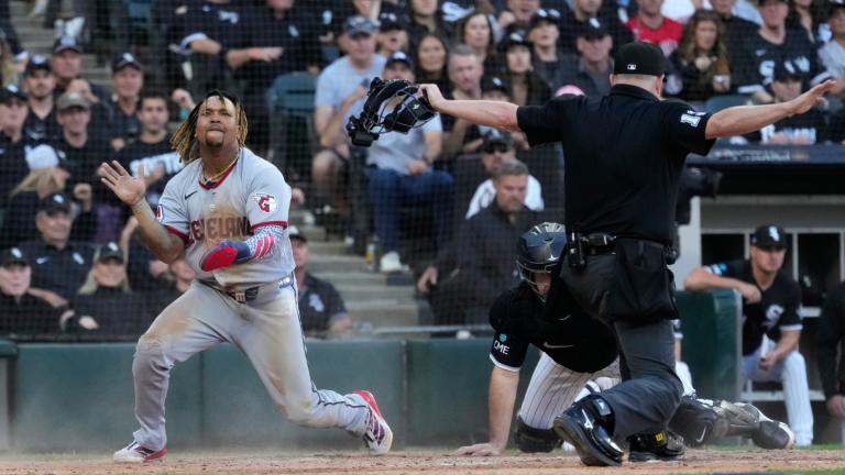 Cleveland Guardians' José Ramírez, left, celebrates after scoring on a fielder's choice by Chase DeLauter during the fifth inning in Game 3 of baseball's American League Division Series against the Chicago White Sox Wednesday, Oct. 7, 2026, in Chicago. (AP Photo / Nam Y. Huh)
