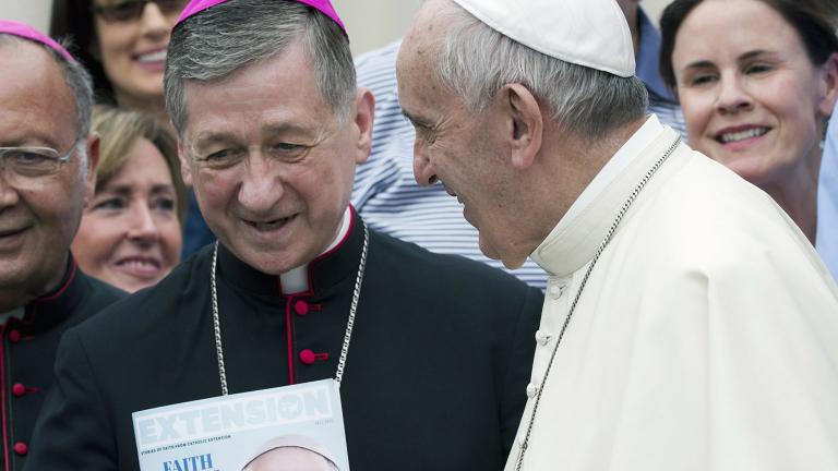 In this Sept. 2, 2015, file photo, Pope Francis, right, salutes Chicago Archbishop Blase Joseph Cupich at the end of his weekly general audience in St. Peter's Square at the Vatican. (Alessandra Tarantino / AP File Photo)