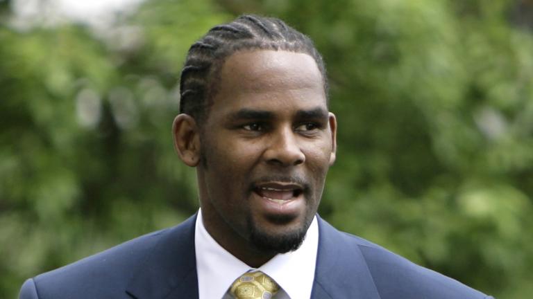 This June 13, 2008 file photo shows R&B singer R. Kelly, arriving at the Cook County Criminal Court Building in Chicago. (AP Photo/M. Spencer Green, File)