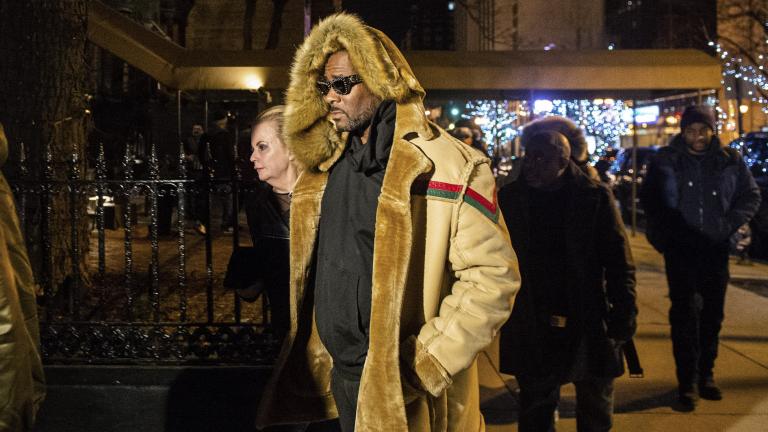 R. Kelly walks to his vehicle after exiting a cigar lounge in Chicago on Monday, Feb. 25, 2019. A suburban Chicago woman posted the $100,000 bail for R. Kelly to be freed from jail while he awaits trial on sexual abuse charges. (Tyler LaRiviere / Chicago Sun-Times via AP) R. Kelly walks to his vehicle after exiting a cigar lounge in Chicago on Monday, Feb. 25, 2019. A suburban Chicago woman posted the $100,000 bail for R. Kelly to be freed from jail while he awaits trial on sexual abuse charges. (Tyler LaRiviere / Chicago Sun-Times via AP)