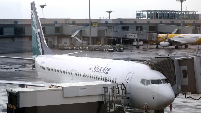 In this Oct. 4, 2017, file photo, SilkAir's new Boeing 737 Max 8 aircraft is seen through a viewing gallery window parked on the tarmac of Singapore’s Changi International Airport. (AP Photo / Wong Maye-E, File) In this Oct. 4, 2017, file photo, SilkAir's new Boeing 737 Max 8 aircraft is seen through a viewing gallery window parked on the tarmac of Singapore’s Changi International Airport. (AP Photo / Wong Maye-E, File)
