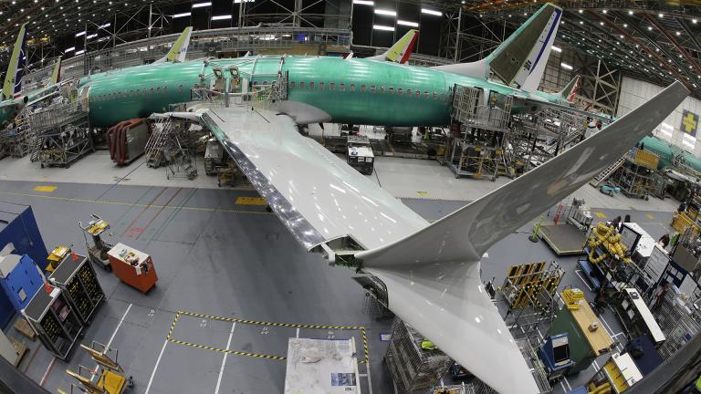 In this March 27, 2019, file photo taken with a fish-eye lens, a Boeing 737 MAX 8 airplane sits on the assembly line during a brief media tour in Boeing's 737 assembly facility in Renton, Washington. (AP Photo / Ted S. Warren, File) In this March 27, 2019, file photo taken with a fish-eye lens, a Boeing 737 MAX 8 airplane sits on the assembly line during a brief media tour in Boeing's 737 assembly facility in Renton, Washington. (AP Photo / Ted S. Warren, File)