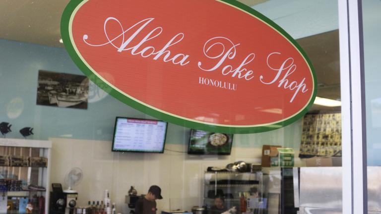 This Tuesday, April 16, 2019, photo shows Aloha Poke Shop, a store in Honolulu. (AP Photo / Audrey McAvoy)