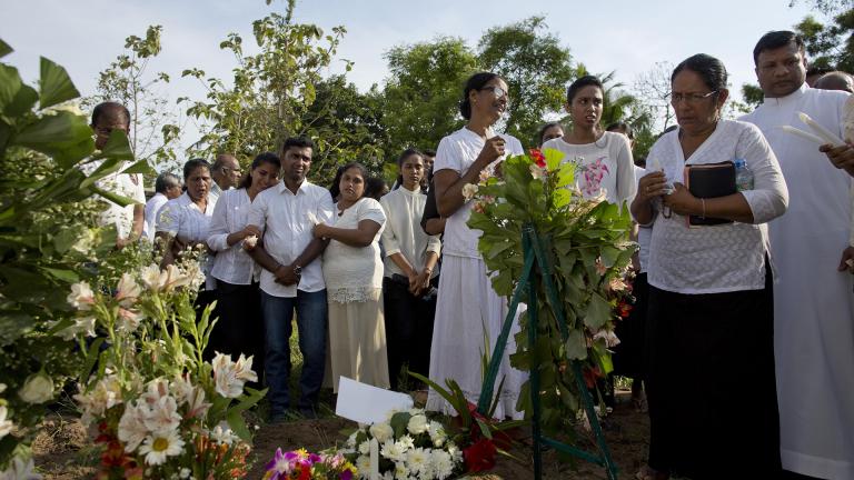 Family members mourn Tuesday, April 23, 2019 at the burial of 7-year-old Dhulodh Anthony, a victim of an Easter Sunday bomb blast, at Methodist cemetery in Negombo, Sri Lanka. (AP Photo / Gemunu Amarasinghe) Family members mourn Tuesday, April 23, 2019 at the burial of 7-year-old Dhulodh Anthony, a victim of an Easter Sunday bomb blast, at Methodist cemetery in Negombo, Sri Lanka. (AP Photo / Gemunu Amarasinghe)