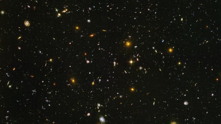 This image made from a composite of September 2003 - January 2004 photos captured by the NASA/ESA Hubble Space Telescope shows nearly 10,000 galaxies in the deepest visible-light image of the cosmos, cutting across billions of light-years. (NASA, ESA, S. Beckwith (STScI), HUDF Team via AP) This image made from a composite of September 2003 - January 2004 photos captured by the NASA/ESA Hubble Space Telescope shows nearly 10,000 galaxies in the deepest visible-light image of the cosmos, cutting across billions of light-years. (NASA, ESA, S. Beckwith (STScI), HUDF Team via AP)