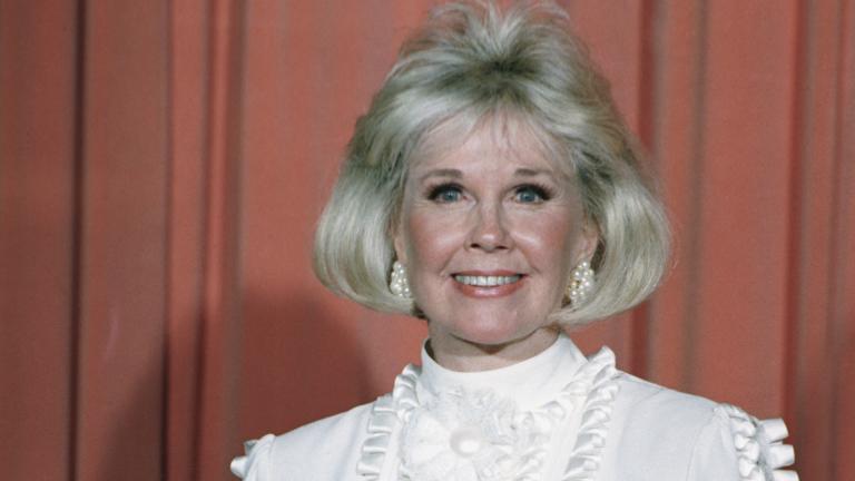 In this Jan. 28, 1989 file photo, actress and animal rights activist Doris Day poses for photos after receiving the Cecil B. DeMille Award she was presented with at the annual Golden Globe Awards ceremony in Los Angeles. (AP Photo, File)
