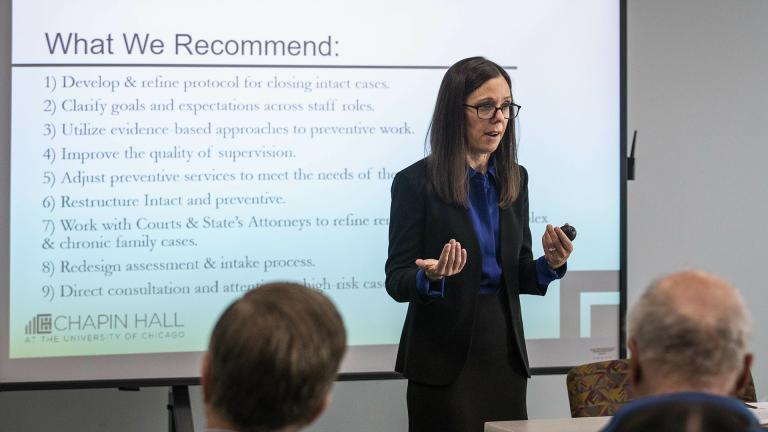 In this May 13, 2019 photo, Dana Weiner, policy fellow at Chapin Hall at the University of Chicago, discusses a review of the Illinois Department of Children and Family Services’ Intact Family Services program, during a press event at DCFS. (Ashlee Rezin/Sun Times via AP)
