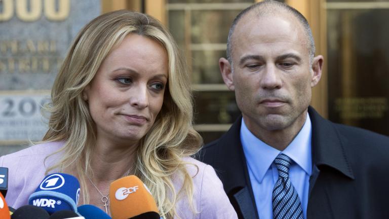 In this April 16, 2018 file photo, adult film actress Stormy Daniels, left, stands with her lawyer Michael Avenatti as she speaks outside federal court, in New York. (AP Photo / Mary Altaffer, File)