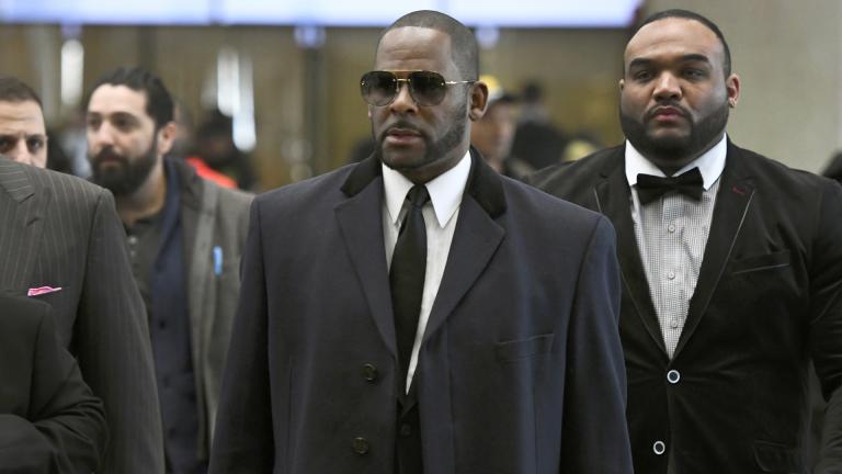In this May 7, 2019 file photo, Musician R. Kelly, center, arrives at the Leighton Criminal Court building for a hearing in Chicago. (AP Photo / Matt Marton, File) In this May 7, 2019 file photo, Musician R. Kelly, center, arrives at the Leighton Criminal Court building for a hearing in Chicago. (AP Photo / Matt Marton, File)