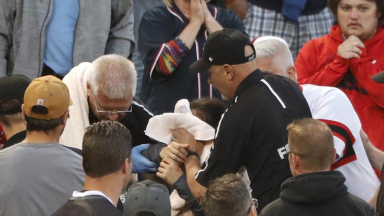 In this Monday, June 10, 2019, file photo, Emergency personal keep a towel on the face of a person who was struck by a line drive by Chicago White Sox’s Eloy Jimenez during the fourth inning of a baseball game against the Washington Nationals in Chicago. (AP Photo / Charles Rex Arbogast, File) In this Monday, June 10, 2019, file photo, Emergency personal keep a towel on the face of a person who was struck by a line drive by Chicago White Sox’s Eloy Jimenez during the fourth inning of a baseball game against the Washington Nationals in Chicago. (AP Photo / Charles Rex Arbogast, File)
