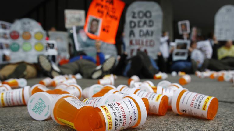 In this April 5, 2019, file photo, containers depicting OxyContin prescription pill bottles lie on the ground in front of the Department of Health and Human Services’ headquarters in Washington as protesters demonstrate against the FDA’s opioid prescription drug approval practices. (AP Photo / Patrick Semansky, File) In this April 5, 2019, file photo, containers depicting OxyContin prescription pill bottles lie on the ground in front of the Department of Health and Human Services’ headquarters in Washington as protesters demonstrate against the FDA’s opioid prescription drug approval practices. (AP Photo / Patrick Semansky, File)