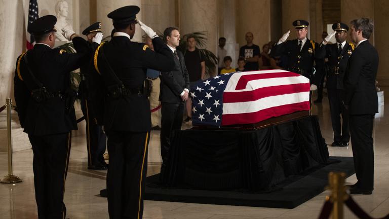 Honor guards salute as they execute the changing of the guard in the Great Hall of the U.S. Supreme Court where the late Supreme Court Justice John Paul Stevens is laying in repose, Monday, July 22, 2019, in Washington. (AP Photo / Manuel Balce Ceneta)