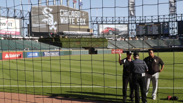 Security personnel at Guaranteed Rate Field are viewed through the newly extended protective netting along left field before a baseball game between the Miami Marlins and the Chicago White Sox, Monday, July 22, 2019, in Chicago. (AP Photo / Charles Rex Arbogast) Security personnel at Guaranteed Rate Field are viewed through the newly extended protective netting along left field before a baseball game between the Miami Marlins and the Chicago White Sox, Monday, July 22, 2019, in Chicago. (AP Photo / Charles Rex Arbogast)