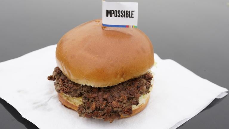 This Jan. 11, 2019, file photo shows the Impossible Burger in Bellevue, Nebraska. After months of shortages, Impossible Foods is partnering with a veteran food production company to ramp up supplies of its popular plant-based burgers. (AP Photo / Nati Harnik, File) This Jan. 11, 2019, file photo shows the Impossible Burger in Bellevue, Nebraska. After months of shortages, Impossible Foods is partnering with a veteran food production company to ramp up supplies of its popular plant-based burgers. (AP Photo / Nati Harnik, File)