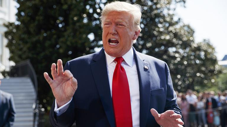 President Donald Trump talks to reporters on the South Lawn of the White House, Friday, Aug. 9, 2019, in Washington, as he prepares to leave Washington for his annual August holiday at his New Jersey golf club.  (AP Photo / Evan Vucci)