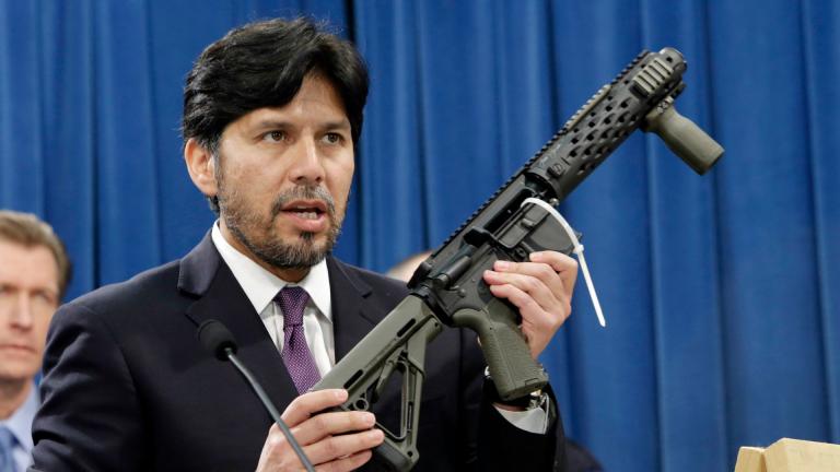In this Jan. 13, 2014 file photo, former California State Sen. Kevin de Leon, D-Los Angeles, displays a homemade fully automatic rifle, confiscated by the Department of Justice, at the Capitol in Sacramento, California. (AP Photo / Rich Pedroncelli, File) In this Jan. 13, 2014 file photo, former California State Sen. Kevin de Leon, D-Los Angeles, displays a homemade fully automatic rifle, confiscated by the Department of Justice, at the Capitol in Sacramento, California. (AP Photo / Rich Pedroncelli, File)