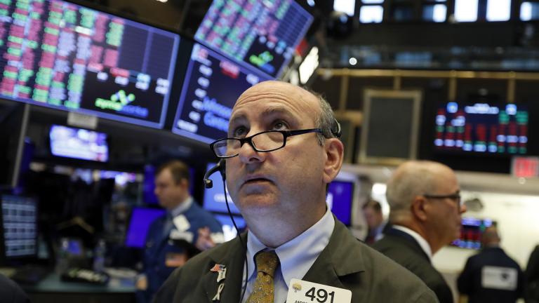 In this Tuesday, Aug. 13, 2019, file photo trader Andrew Silverman works on the floor of the New York Stock Exchange. (AP Photo / Richard Drew, File) In this Tuesday, Aug. 13, 2019, file photo trader Andrew Silverman works on the floor of the New York Stock Exchange. (AP Photo / Richard Drew, File)