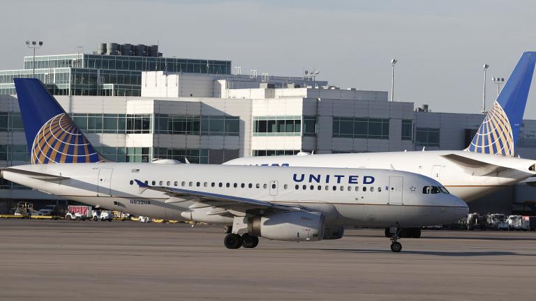  In this June 26, 2019, file photo United Airlines jetliners pass each other at Denver International Airport. (AP Photo / David Zalubowski, File)