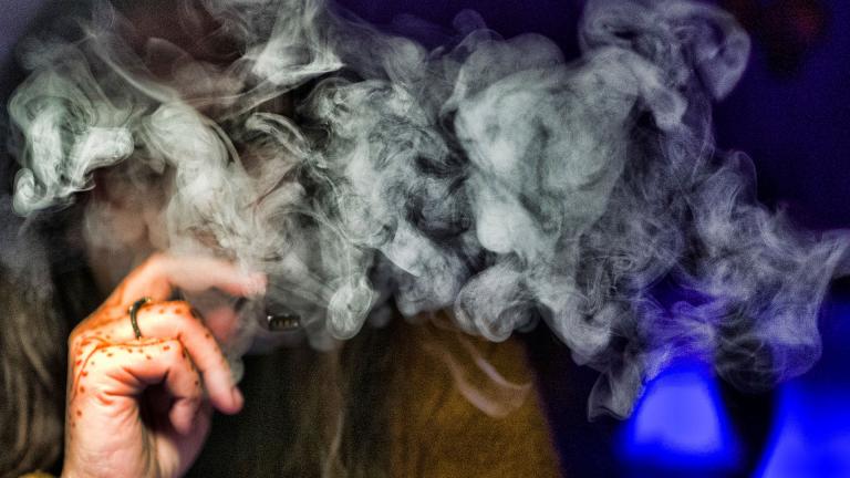 In this Saturday, Dec. 22, 2018 file photo, a woman takes a puff from a cannabis vape pen in Los Angeles. (AP Photo / Richard Vogel)