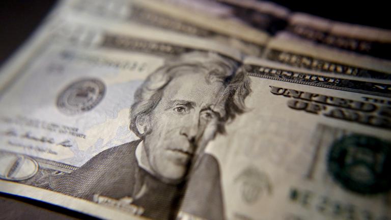 This June 13, 2018 file photo, shows United States currency in Zelienople, Pennsylvania. (AP Photo / Keith Srakocic, File)