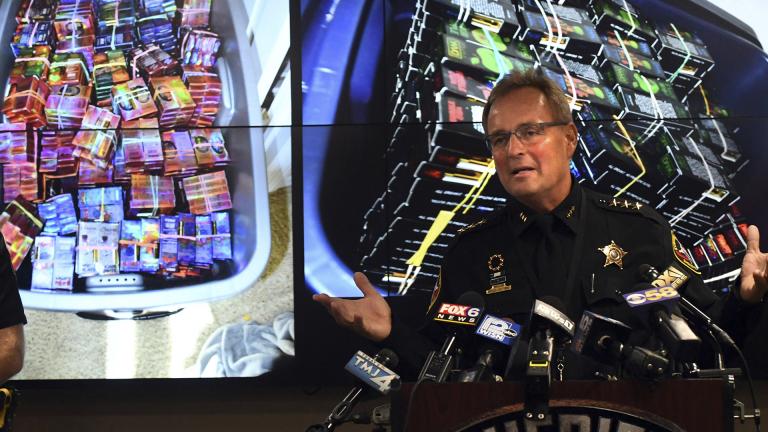 Kenosha County Sheriff David Beth talks about the THC-infused vaping cartridges that were part of a large-scale marijuana operation during a news conference in Kenosha Wednesday, Sept. 11, 2019. (Paul Williams / The Kenosha News via AP)