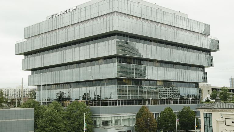 Cars pass Purdue Pharma headquarters Thursday, Sept. 12, 2019, in Stamford, Connecticut. (AP Photo / Frank Franklin II)