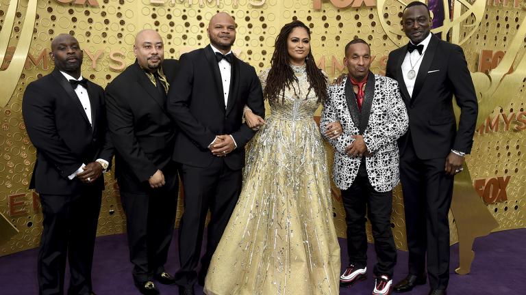 Ava DuVernay, center, is joined by Antron McCray, Raymond Santana, Kevin Richardson, Korey Wise and Yusef Salaam, of the Central Park Five, during arrivals of the 71st Primetime Emmy Awards on Sunday, Sept. 22, 2019, at the Microsoft Theater in Los Angeles. (Photo by Jordan Strauss/Invision/AP)