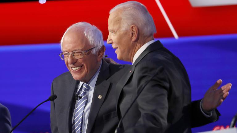 Democratic presidential candidate Sen. Bernie Sanders, I-Vt., left, and former Vice President Joe Biden hug during a Democratic presidential primary debate hosted by CNN/New York Times at Otterbein University, Tuesday, Oct. 15, 2019, in Westerville, Ohio. (AP Photo / John Minchillo)