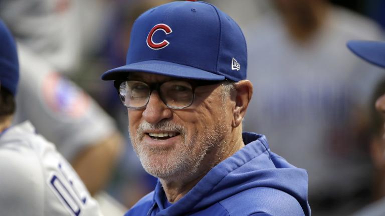 In this Sept. 25, 2019, file photo, then-Chicago Cubs manager Joe Maddon stands in the dugout before a baseball game against the Pittsburgh Pirates, in Pittsburgh. (AP Photo / Gene J. Puskar, File)