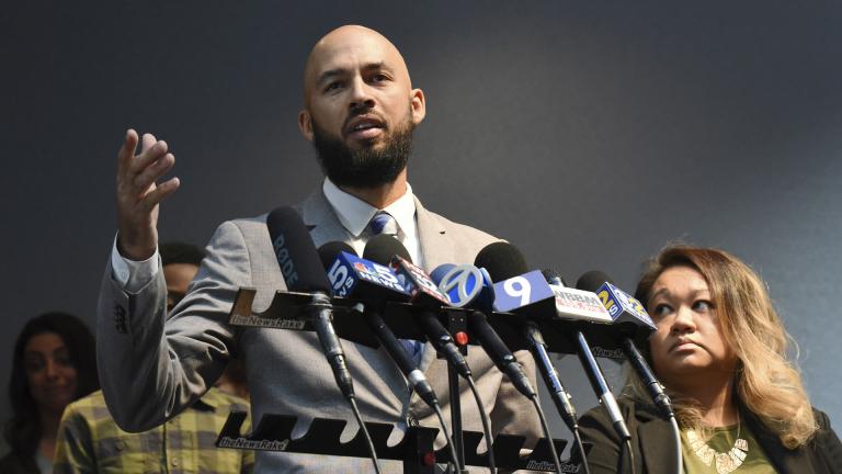 Justin Vahl of Montgomery, Illinois and his wife, Mary, right, speak during a press conference Tuesday, Nov. 5, 2019 about how he was asked to move at a Buffalo Wild Wings restaurant in Naperville because a nearby couple didn't want to sit near blacks. (Paul Valade / Daily Herald via AP)