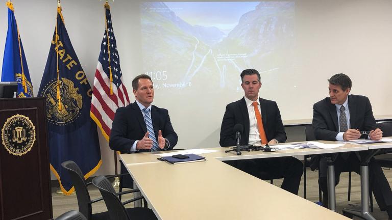 In this Friday, Nov. 8, 2019, photo, FBI Assistant Special Agent in Charge George Chamberlin, from left, speaks as Gabriel Gundersen, an FBI supervisory special agent with the Oregon Cyber Task Force, center, and Loren Cannon, FBI special agent in charge of the Portland Division, in Portland, Oregon to reporters about the rise of cybercrime in Oregon. (AP Photo / Andrew Selsky)