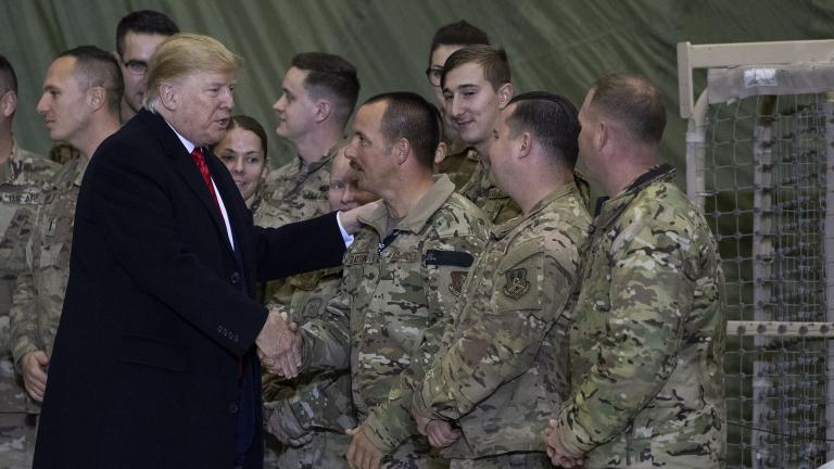 President Donald Trump greeting members of the military after speaking to members of the military during a surprise Thanksgiving Day visit, Thursday, Nov. 28, 2019, at Bagram Air Field, Afghanistan. (AP Photo / Alex Brandon)