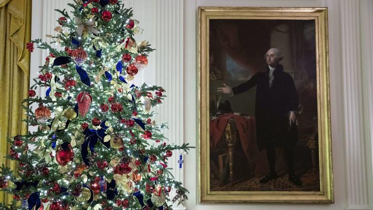 A decorated tree stands next to the portrait of President George Washington in the East Room during the 2019 Christmas preview at the White House, Monday, Dec. 2, 2019, in Washington. (AP Photo / Alex Brandon)