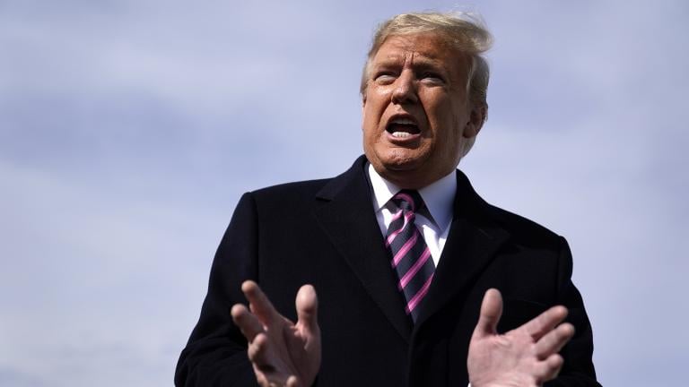 President Donald Trump talks to the media before he boards Air Force One for a trip to Los Angeles to attend a campaign fundraiser, Tuesday, Feb. 18, 2020, at Andrews Air Force Base, Md. (AP Photo / Evan Vucci)