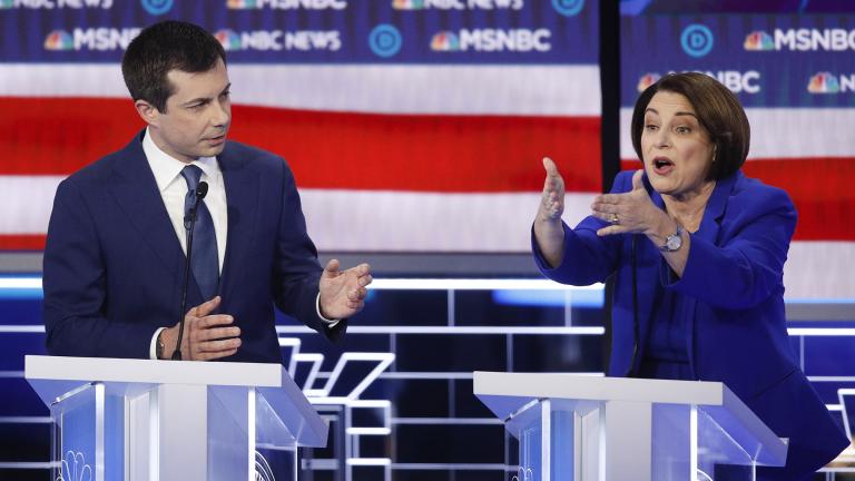 Democratic presidential candidates, Sen. Amy Klobuchar, D-Minn., right, speaks as former South Bend Mayor Pete Buttigieg looks on during a Democratic presidential primary debate Wednesday, Feb. 19, 2020, in Las Vegas, hosted by NBC News and MSNBC. (AP Photo / John Locher)
