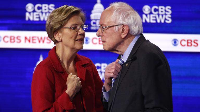 From left, Democratic presidential candidates, Sen. Elizabeth Warren, D-Mass., talks with Sen. Bernie Sanders, I-Vt., during a Democratic presidential primary debate at the Gaillard Center, Tuesday, Feb. 25, 2020, in Charleston, S.C., co-hosted by CBS News and the Congressional Black Caucus Institute. (AP Photo / Patrick Semansky)