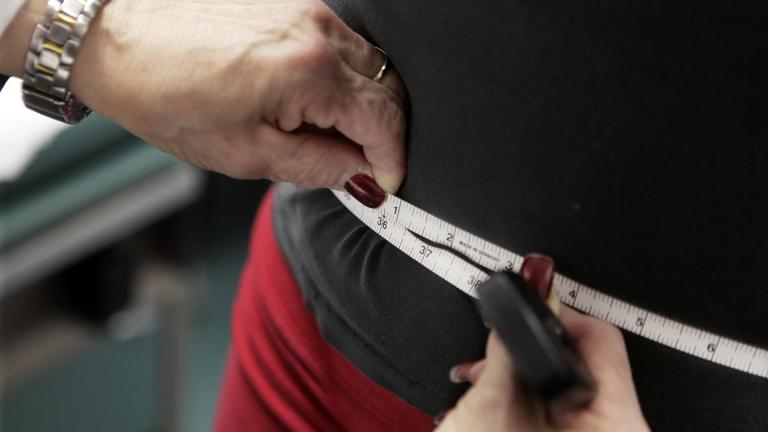 In this Jan. 20, 2010 file photo, a subject’s waist is measured during an obesity prevention study in Chicago. (AP Photo / M. Spencer Green, File) In this Jan. 20, 2010 file photo, a subject’s waist is measured during an obesity prevention study in Chicago. (AP Photo / M. Spencer Green, File)