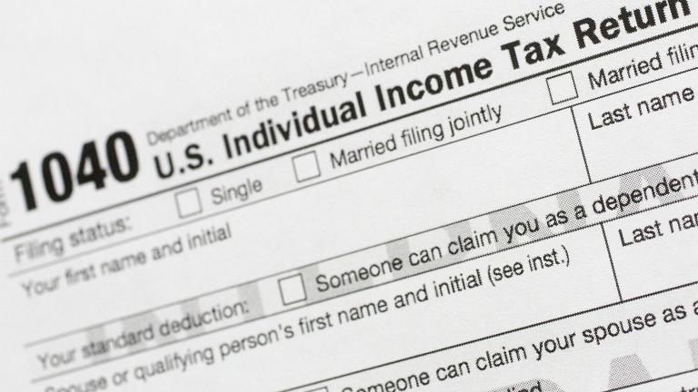 This July 24, 2018, file photo shows a portion of the 1040 U.S. Individual Income Tax Return form. The Trump administration is working on plans to delay the April 15 federal tax deadline for most individual taxpayers as well as small businesses. (AP Photo / Mark Lennihan, File)