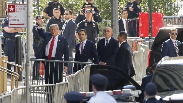 Former President Donald Trump arrives at Manhattan criminal court with his legal team, Monday, April 15, 2024, in New York. The hush money trial of former President Donald Trump begins Monday with jury selection. It's a singular moment for American history as the first criminal trial of a former U.S. commander in chief. (AP Photo/Stefan Jeremiah)